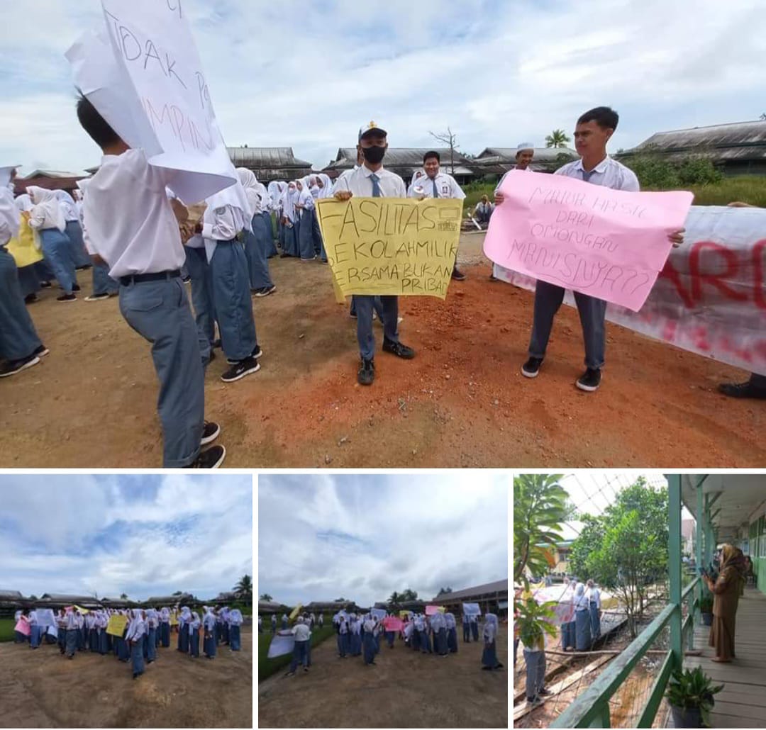 Plt Kepsek ini di Demo, Malah Asik Ngambil Foto 